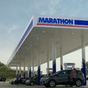 The Marathon gas station logo featuring a large red "M" above the word "Marathon" in blue on a white background with a blue border.